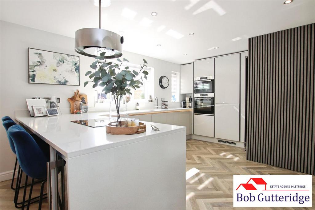 Open plan fitted kitchen/dining room
