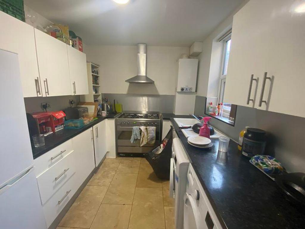 A bright and functional kitchen equipped with e...