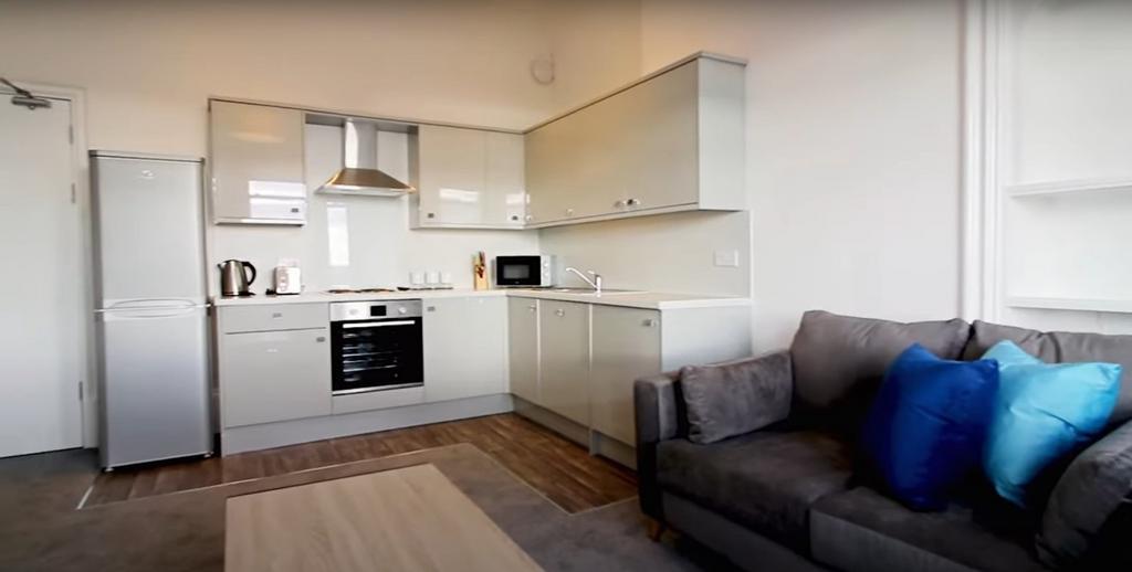 A modern living area with a compact but well-eq...