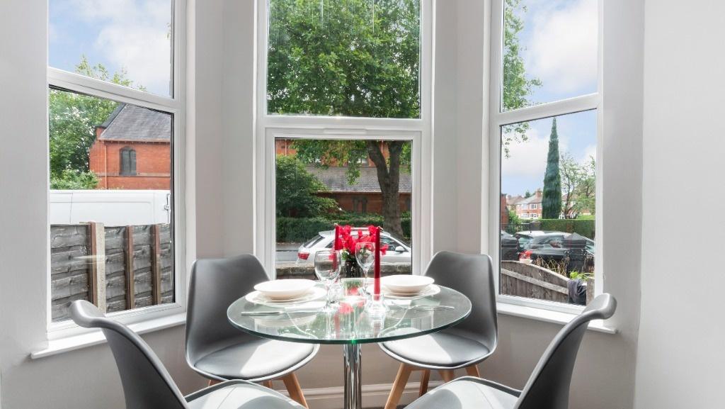 Bright and inviting kitchen nook with ample nat...