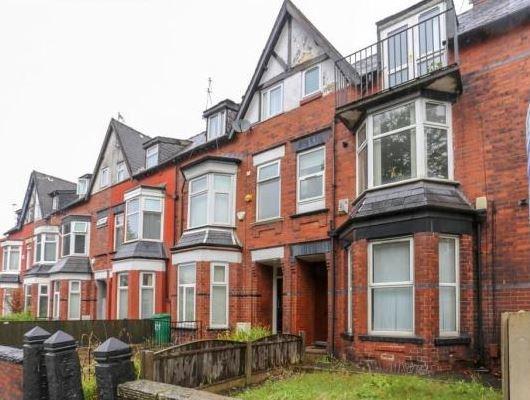 Charming front view of a traditional red-brick ...