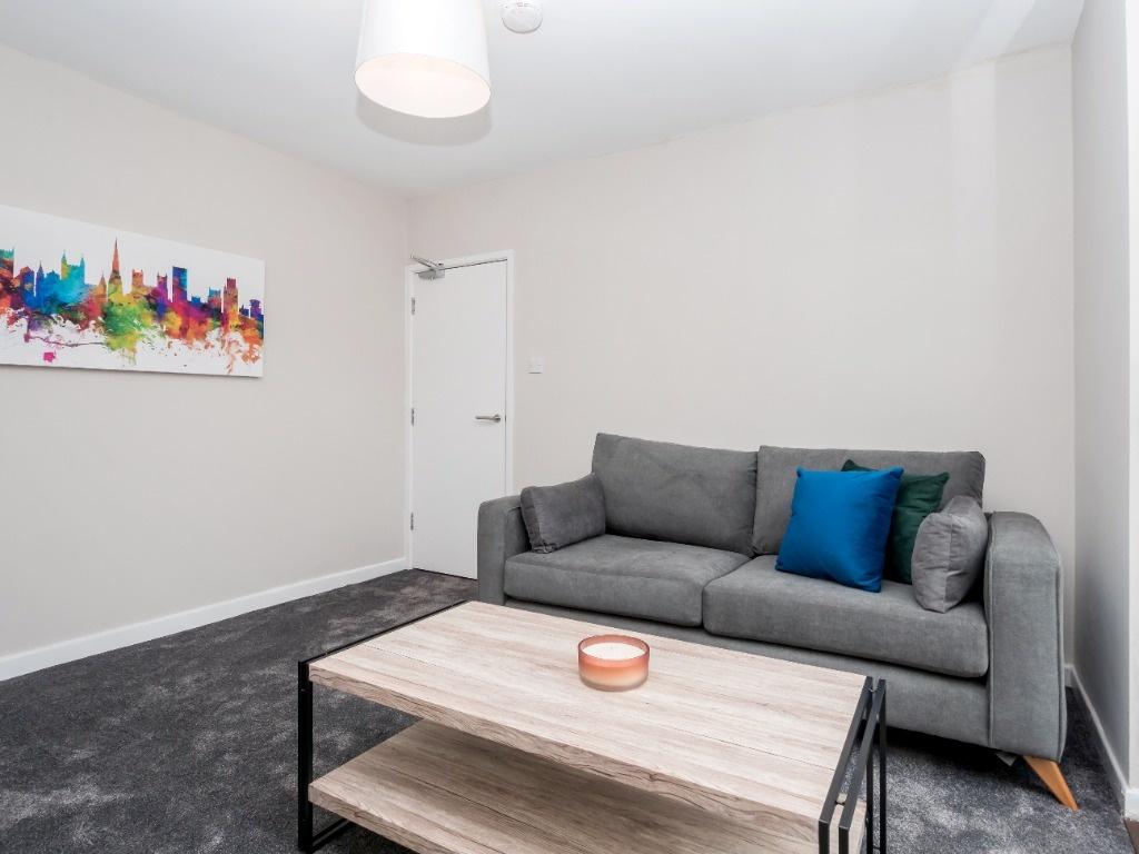 Bright and inviting living room featuring a mod...