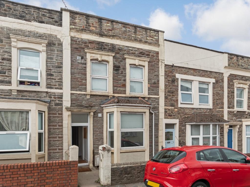 Charming front view of a terraced property feat...