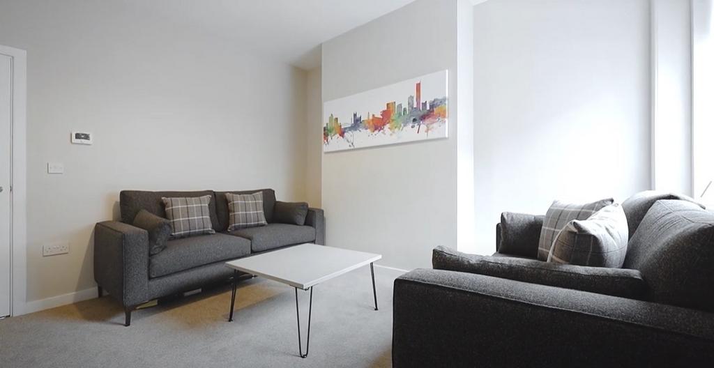 A cozy living room featuring modern furnishings...