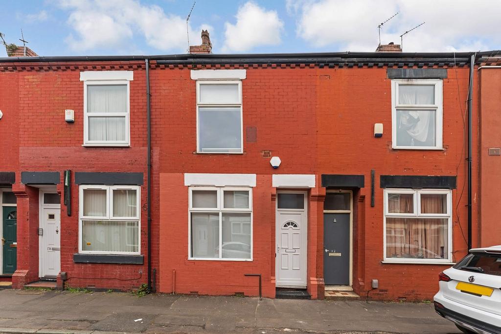 Charming red-brick facade with inviting entranc...