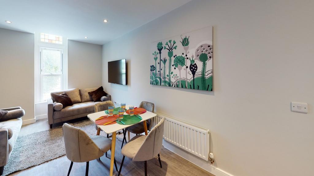 A bright and spacious modern living room, perfe...