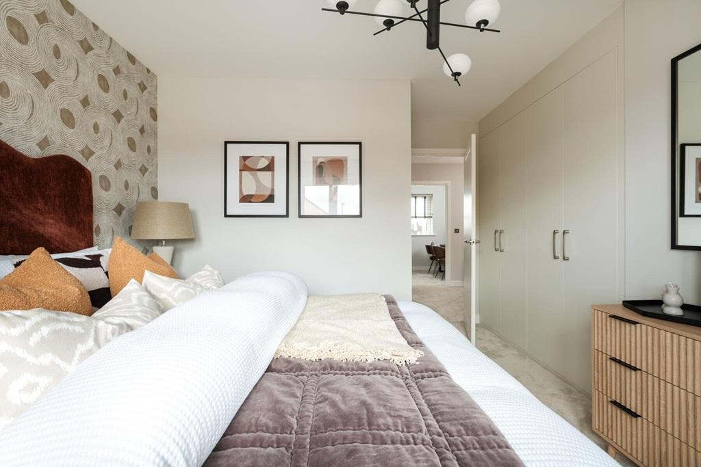 The king-size bedroom has space for fitted...