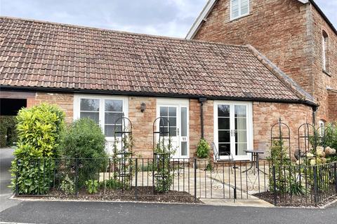 2 bedroom bungalow for sale, Two Bedroom Character Home With Parking & Courtyard Garden