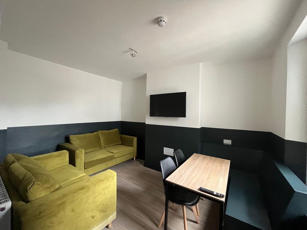 A modern and inviting living room with comforta...