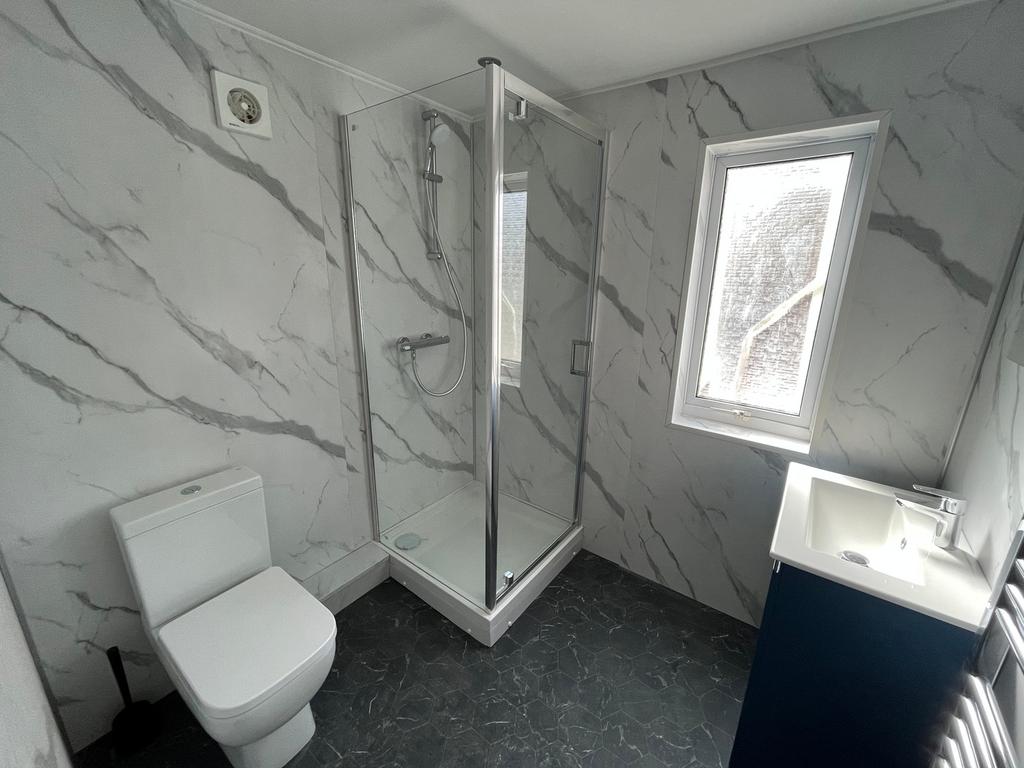 A modern and clean bathroom featuring a stylish...