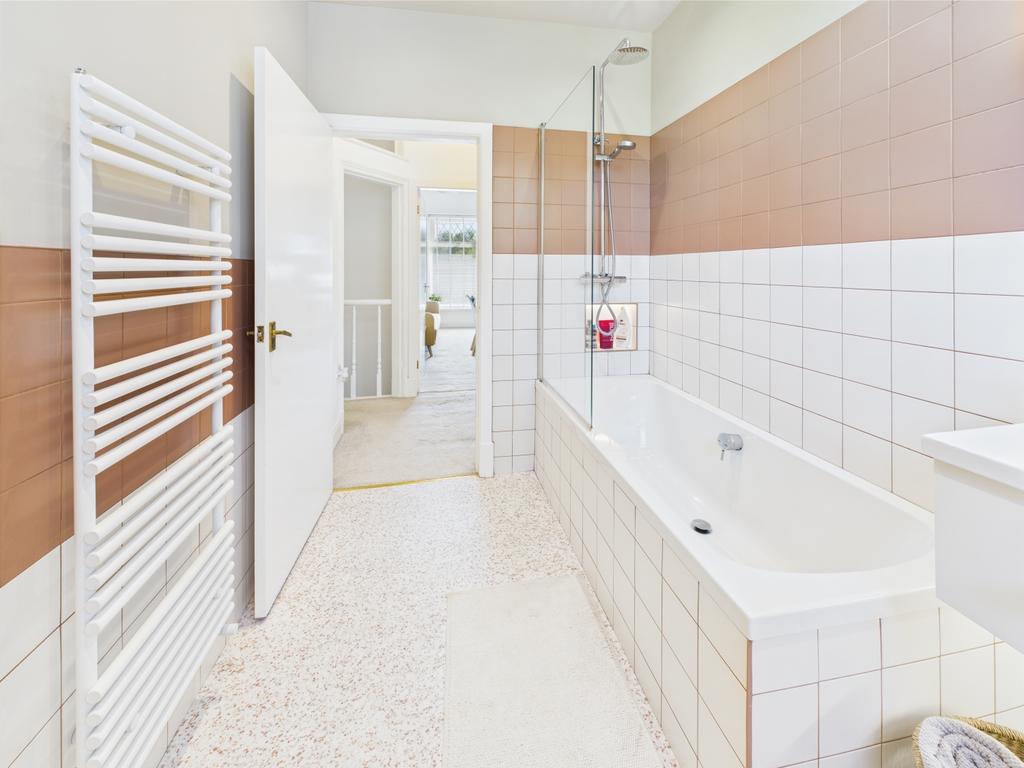 Bathroom with Over Bath Shower