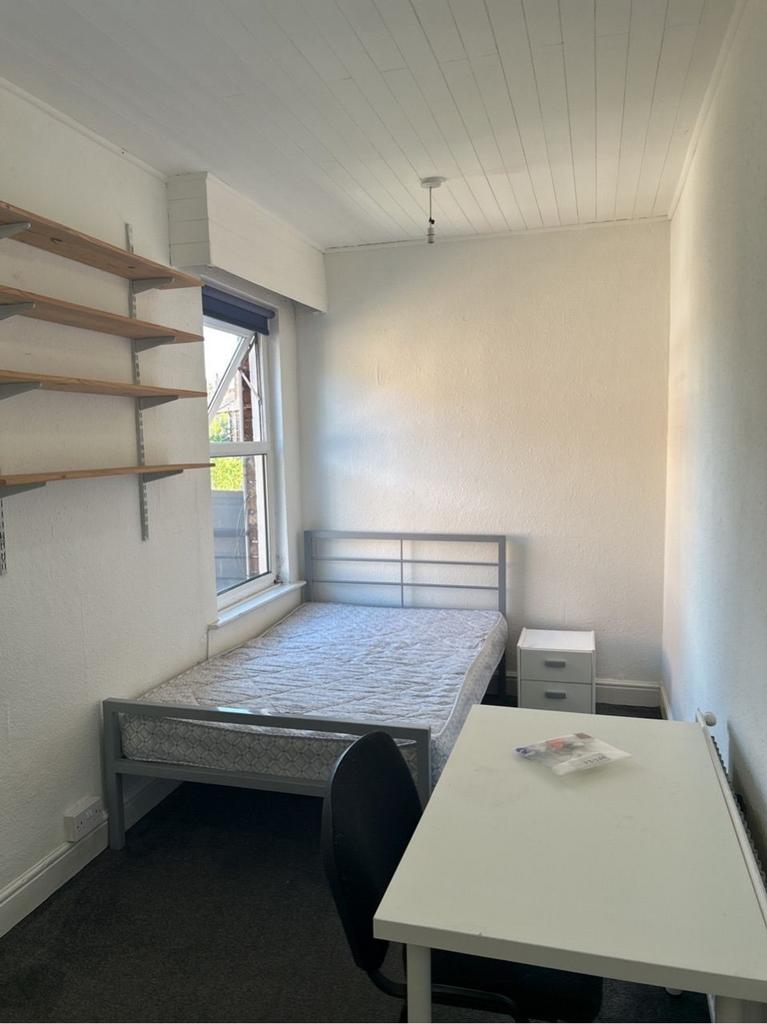 Bright and inviting double bedroom featuring a ...