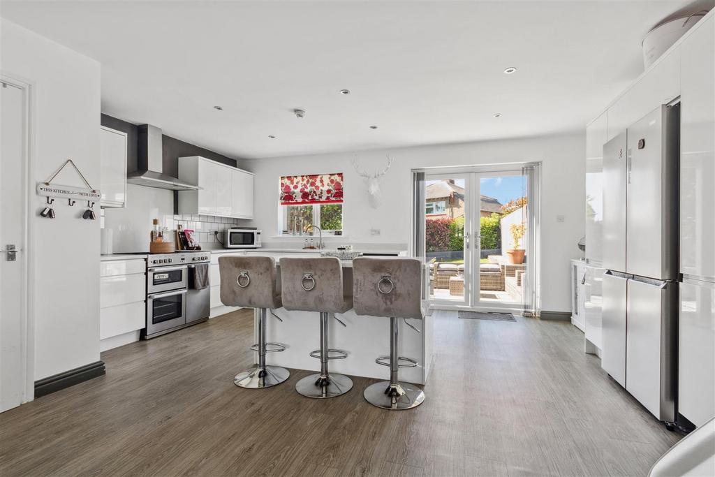 Bespoke ftted kitchen/leading to garden