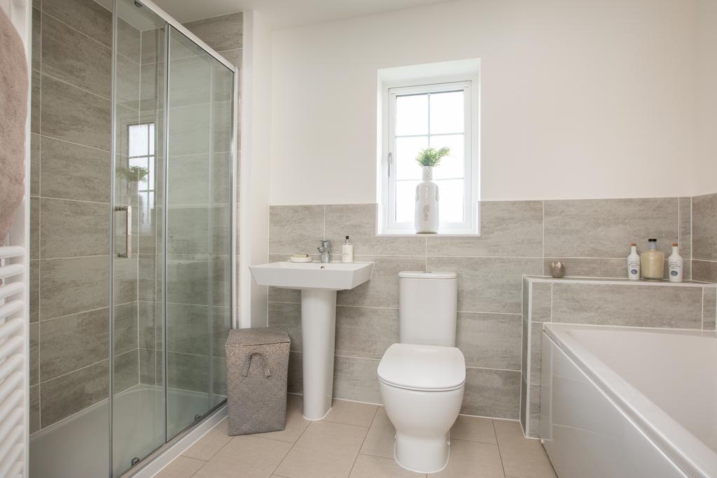 Family bathroom with bath and shower 4 bedroom...