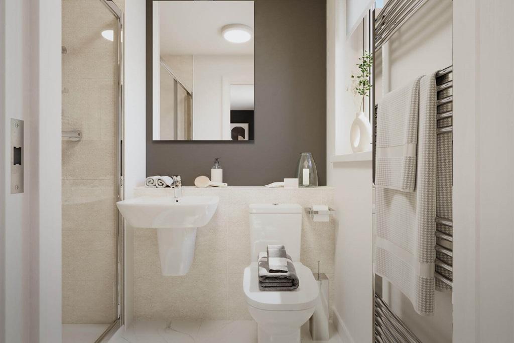 The main bedroom also hosts a private en suite...