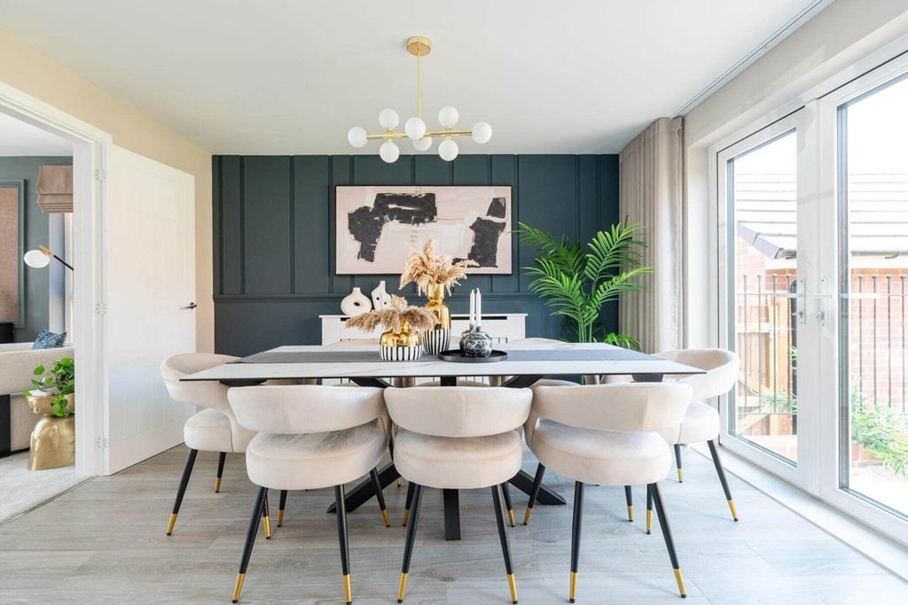 Double doors lead from the dining area to the...