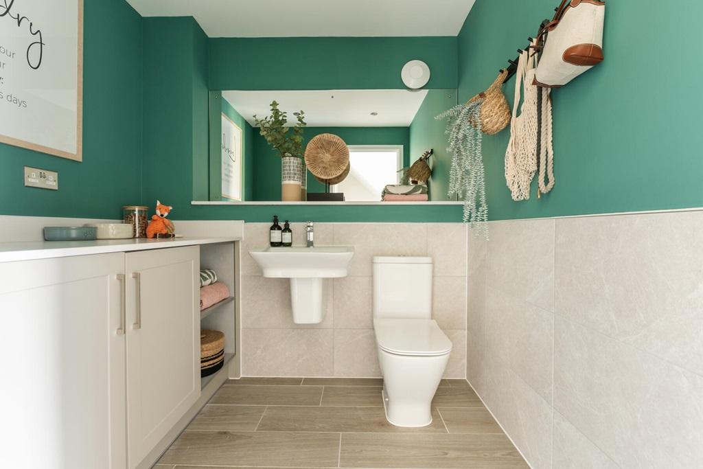 Large cloakroom with utility area for the...