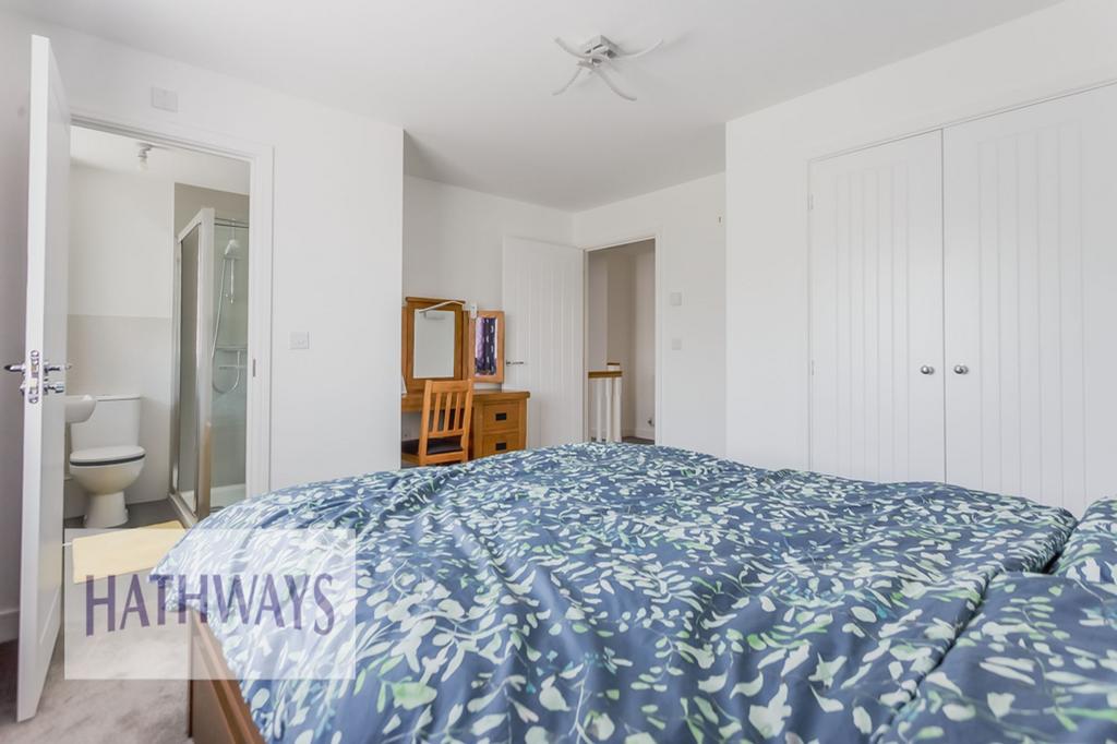Master bedroom with a built-in wardrobe