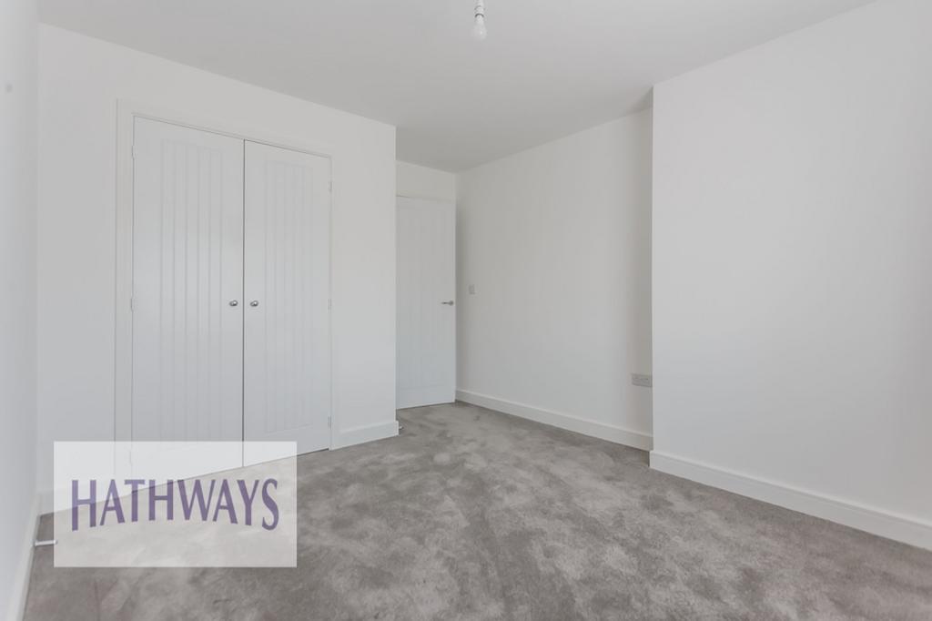 Bedroom with a built-in wardrobe