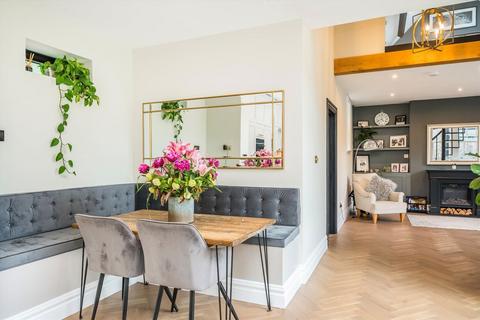 54a Mostyn Road, London, SW19 3LN
