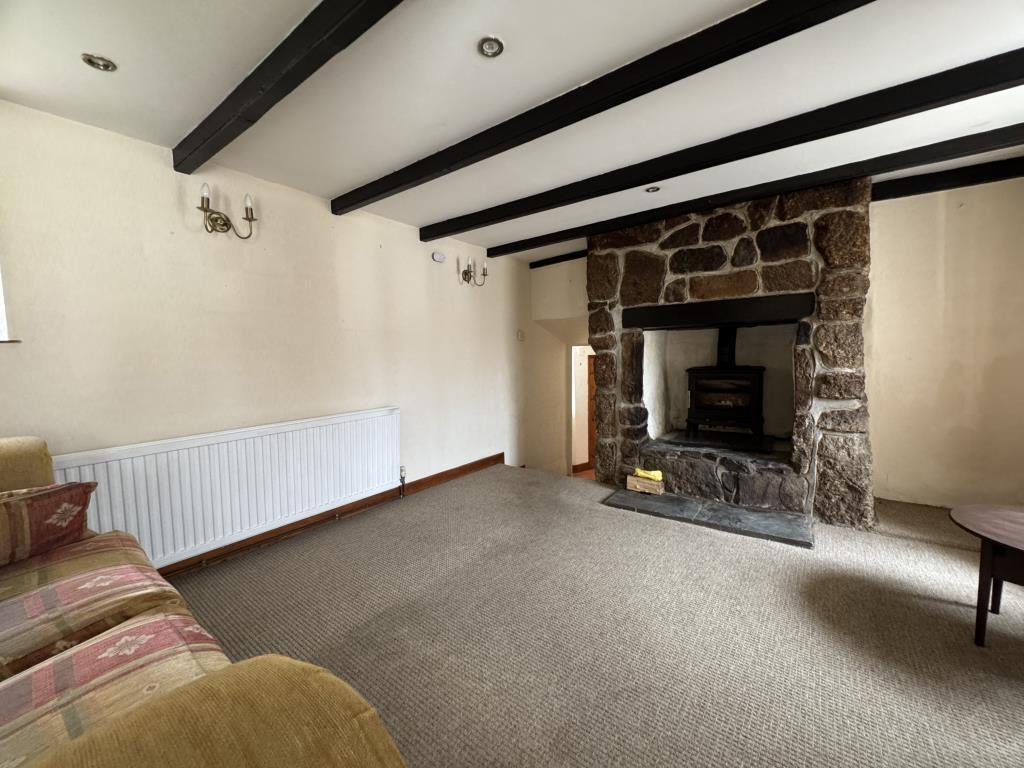 Sitting room with feature fire place