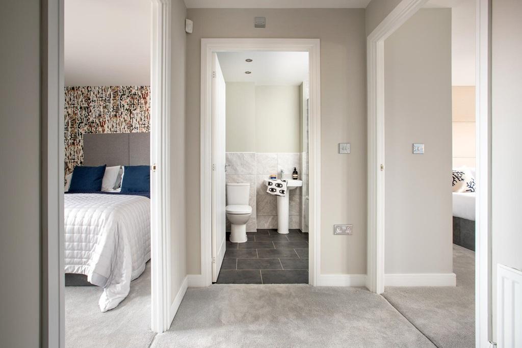 Two bedrooms and the main family bathroom on...