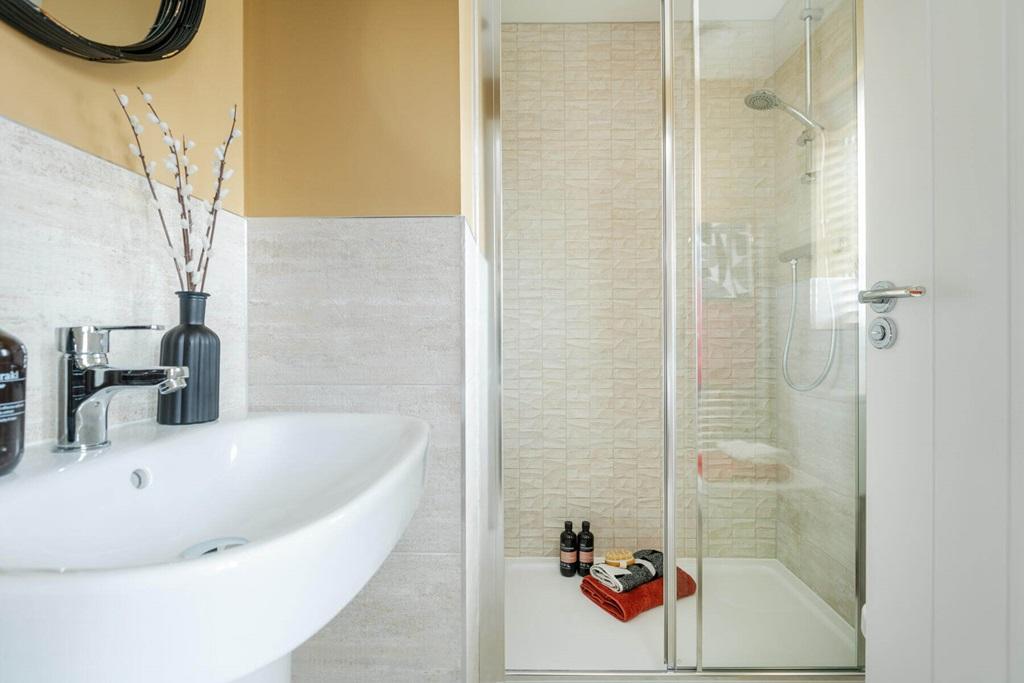 The main bedroom also hosts a private en-suite...