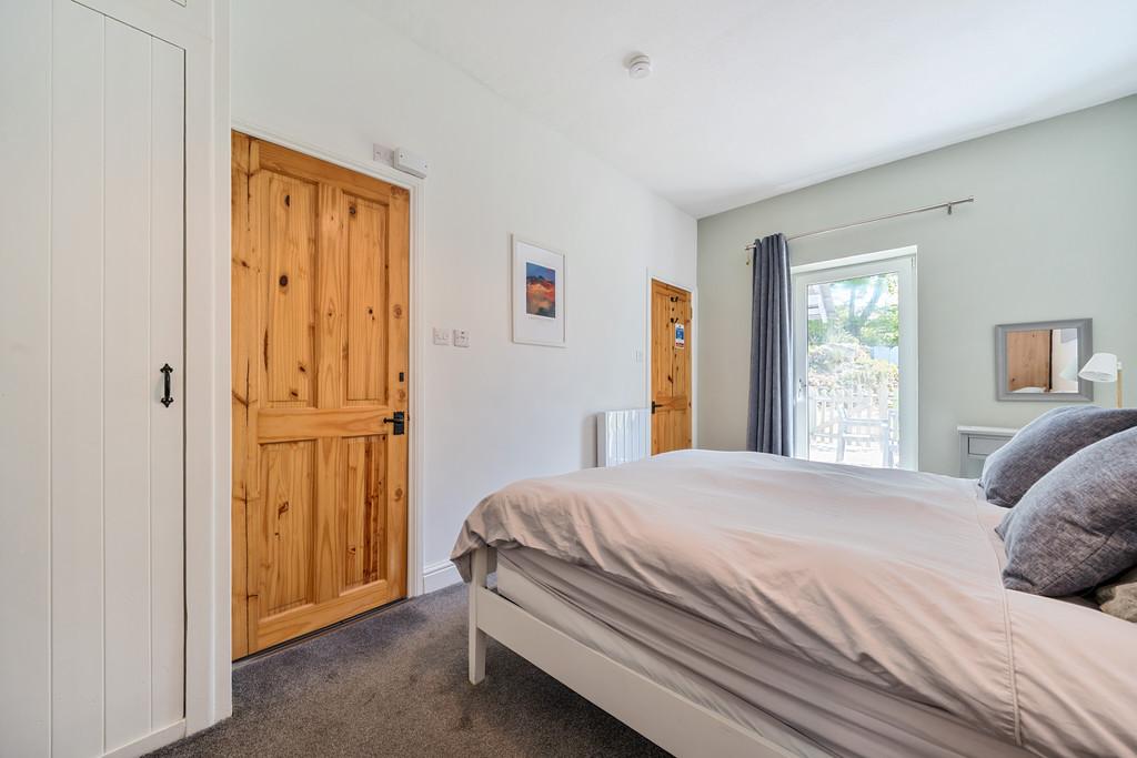 Bedroom &amp; door to front garden
