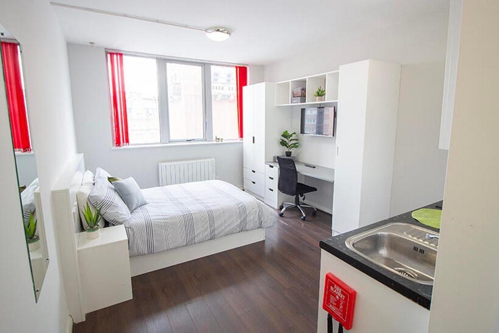 Bright and inviting double bedroom featuring a ...