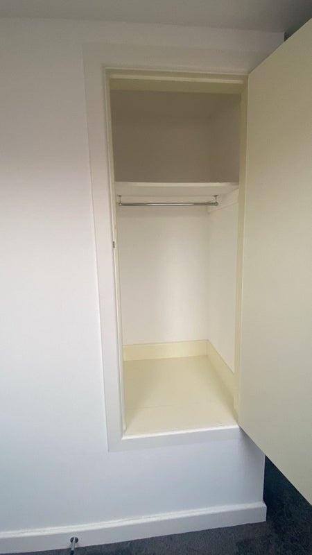 A clean and well-maintained built-in storage cl...