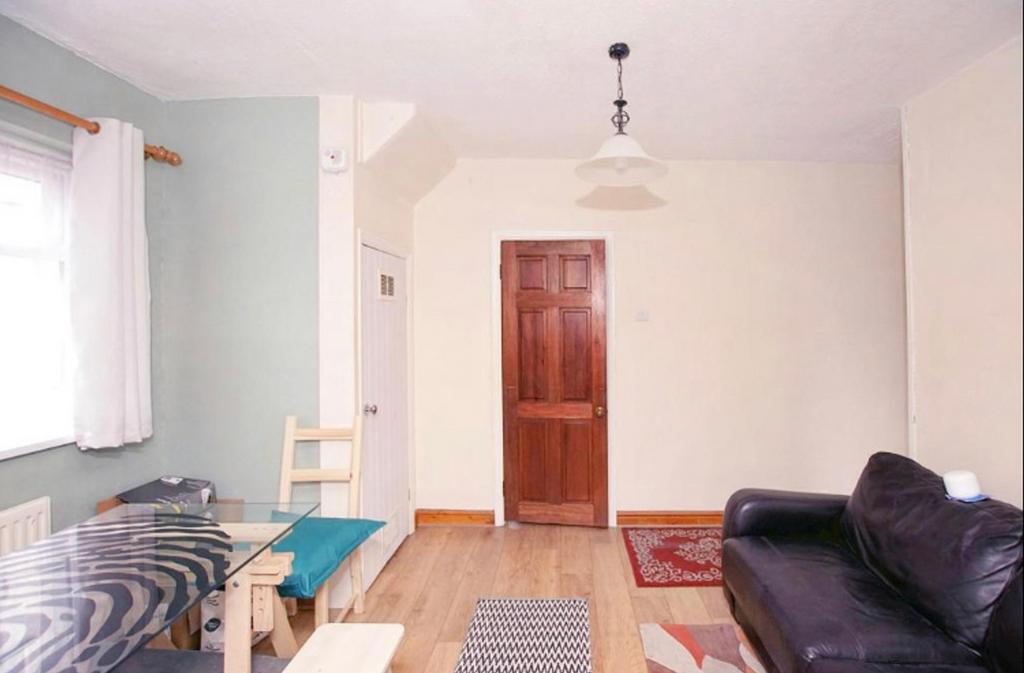 A bright and inviting living room with a cozy a...