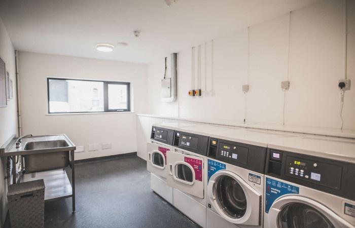 A clean and well-maintained laundry room featur...