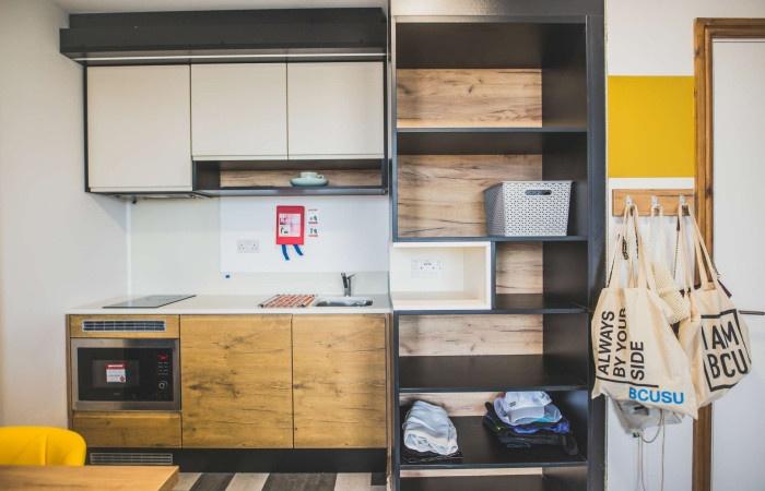 A bright and modern kitchenette featuring sleek...