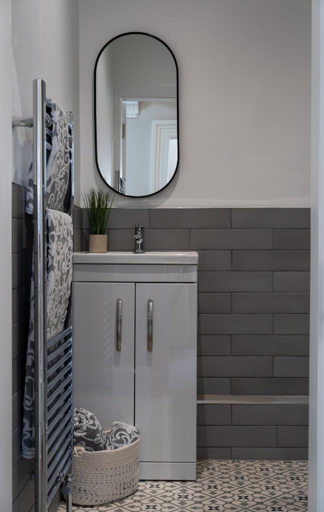 Modern bathroom featuring sleek design elements...