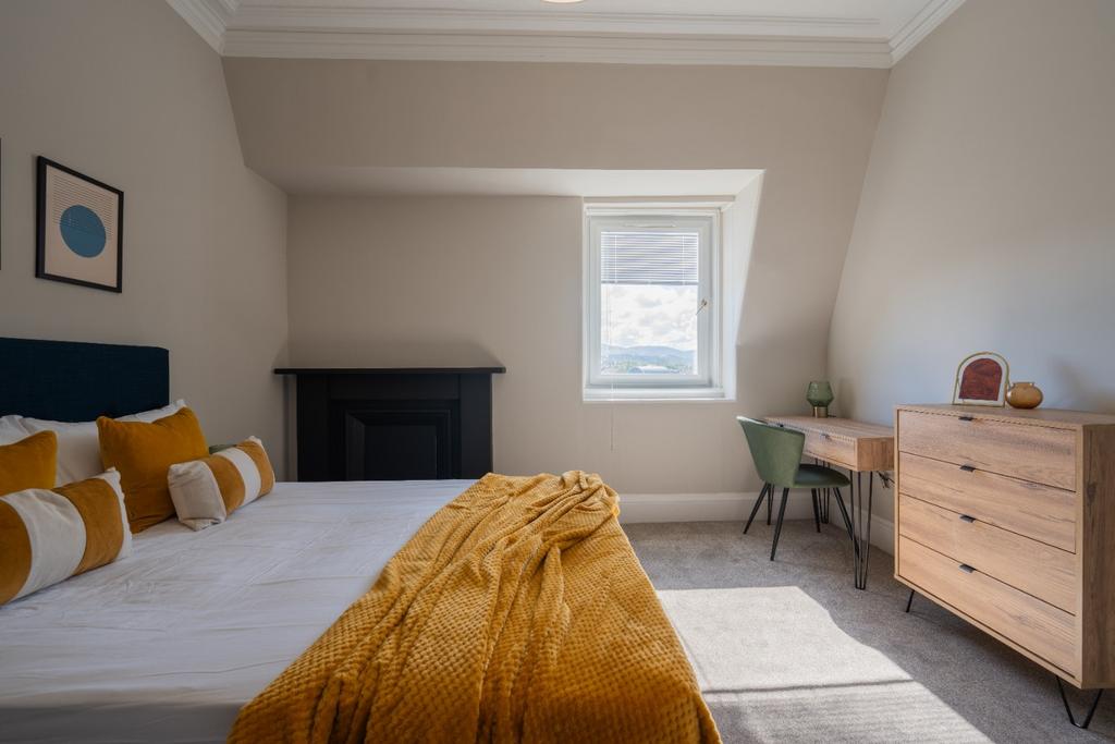 A beautifully presented double bedroom featurin...