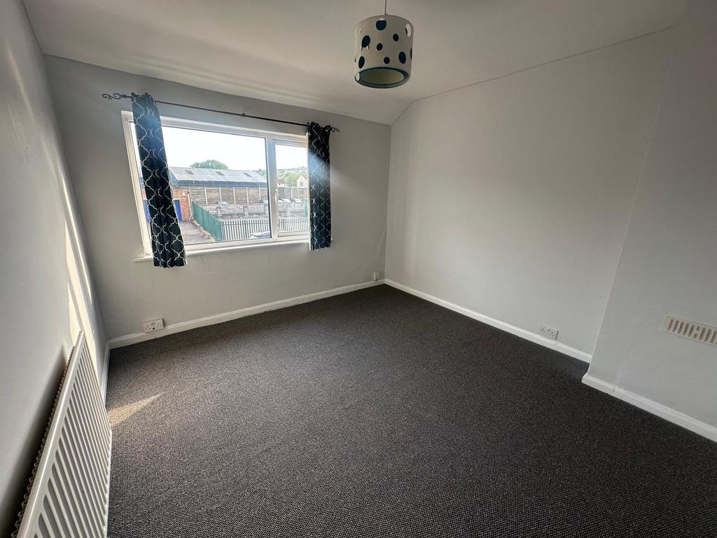Bright and fresh double bedroom featuring a lar...
