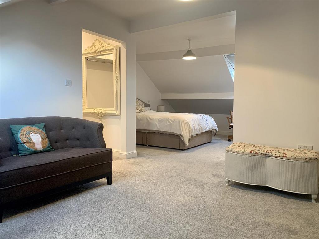 Bedroom Two and seating area.JPG