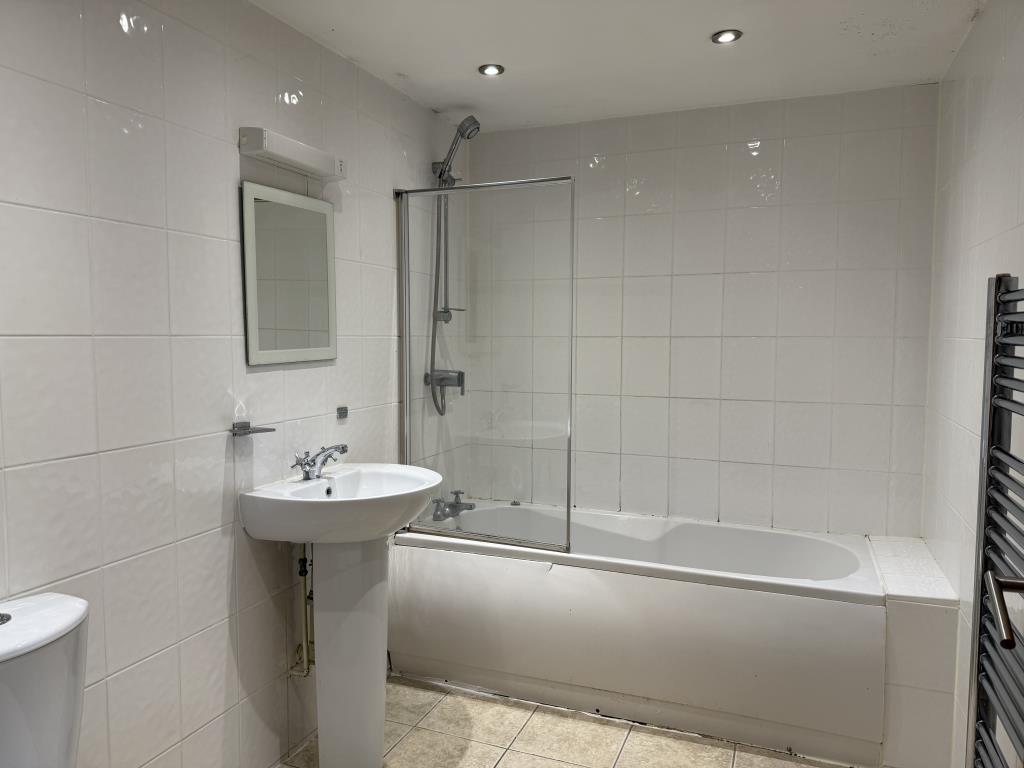 Vacant Flat B Bathroom with white suite