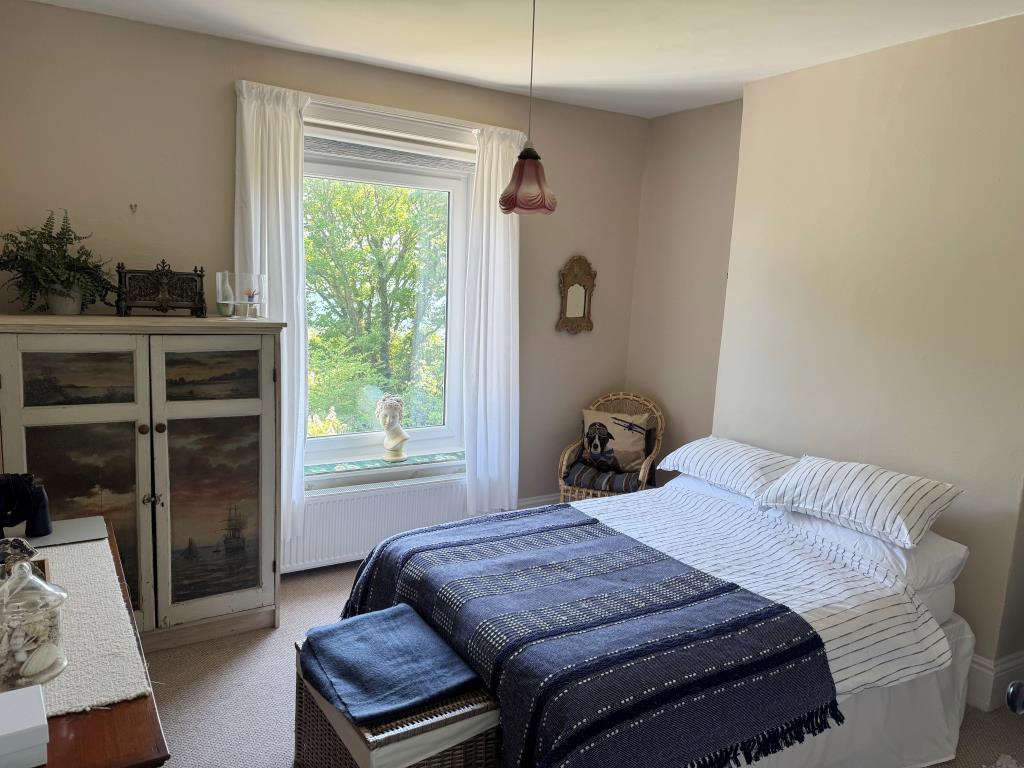 A Bedroom at the Rear of the House