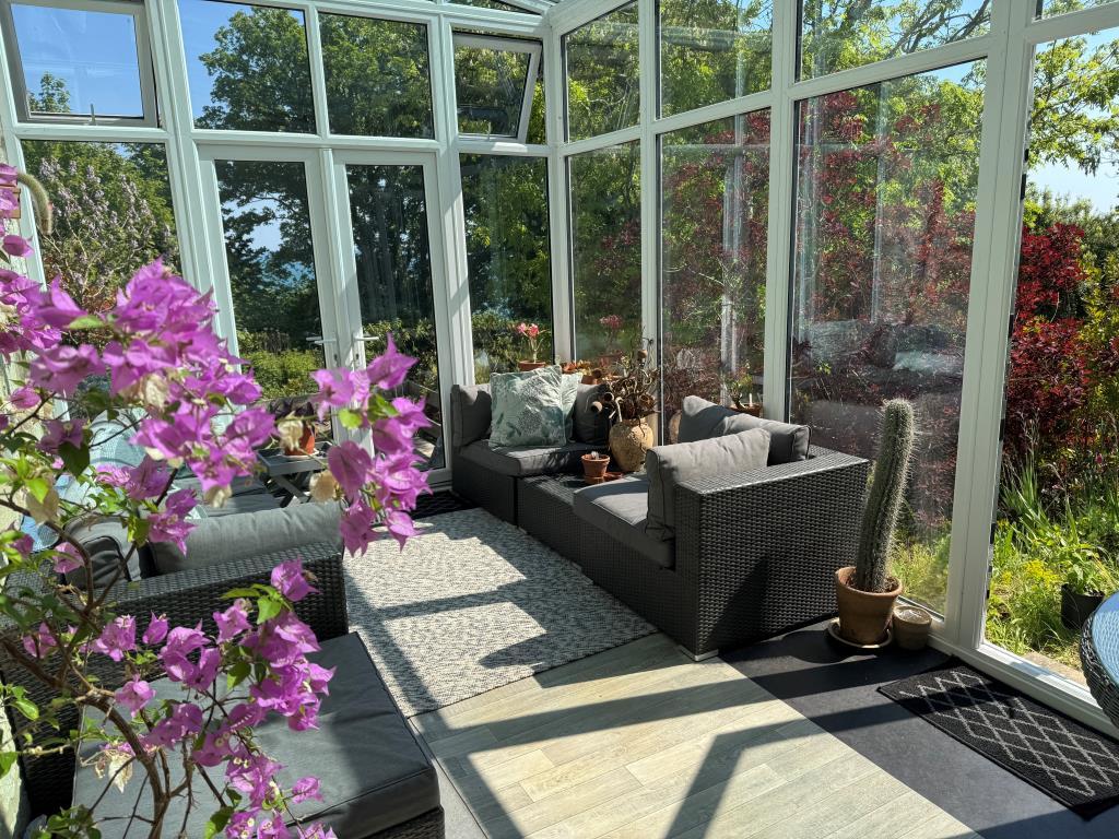 The Sunroom at the Side of the House