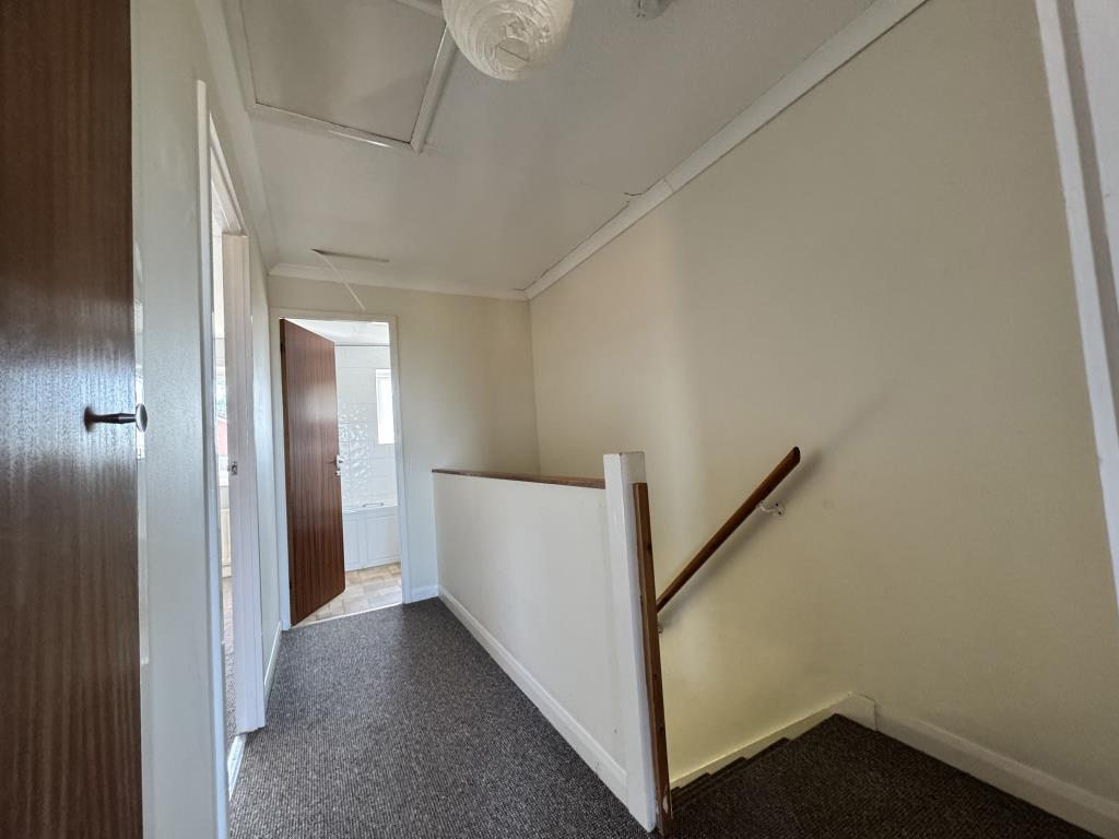 Landing area with access to the loft space