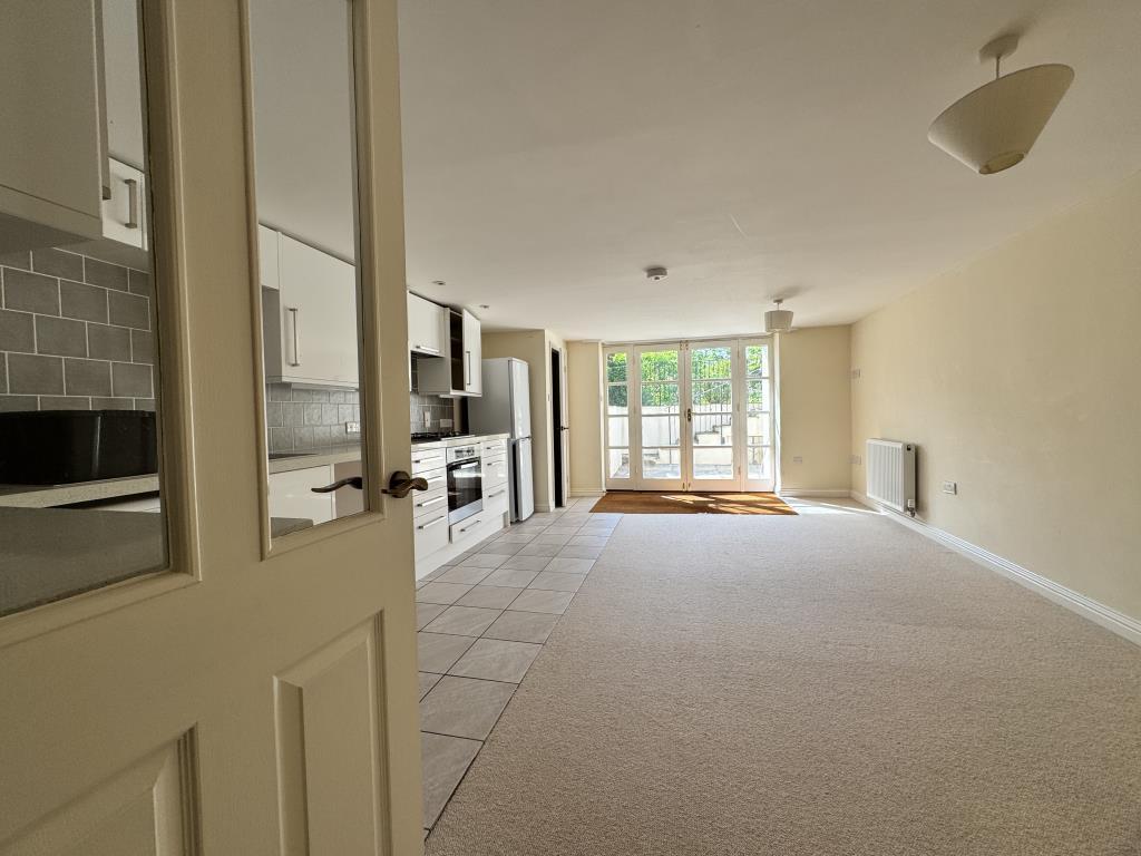 Basement living/dining room and kitchen areas
