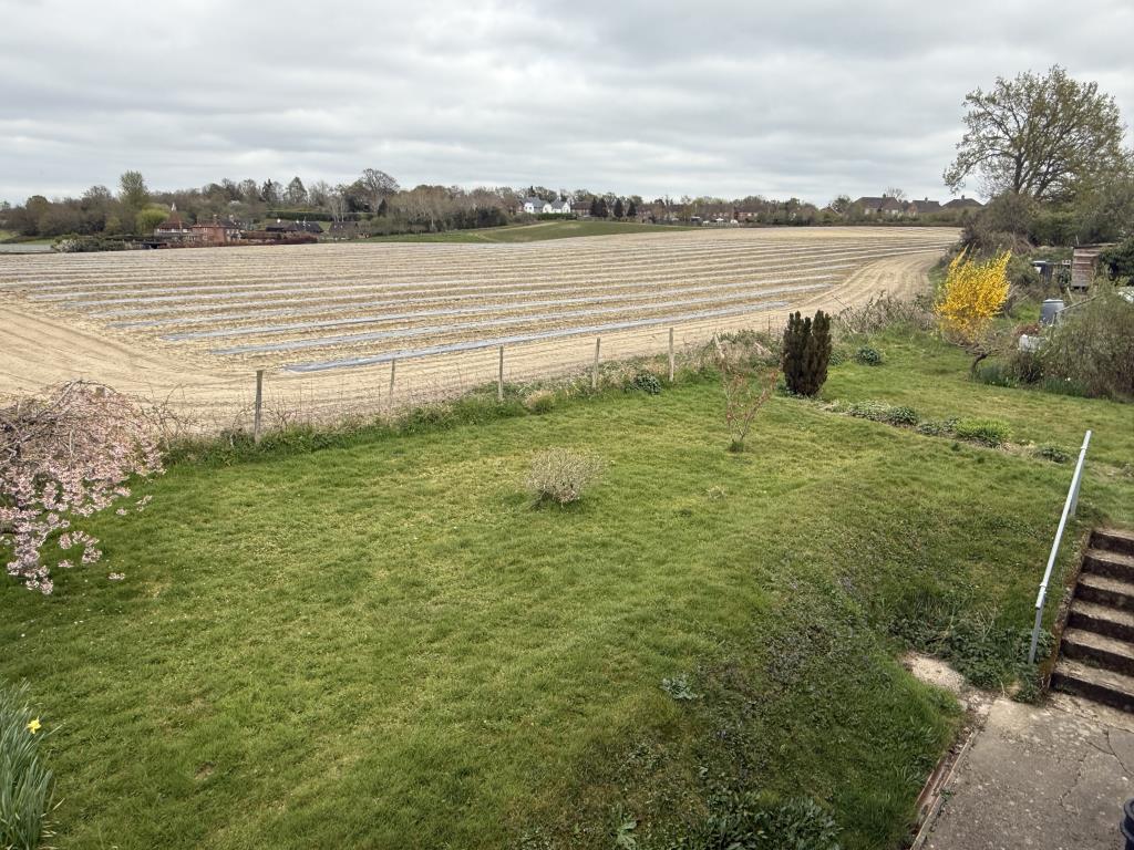 Rear view from Bedroom in rural semi in need of mo