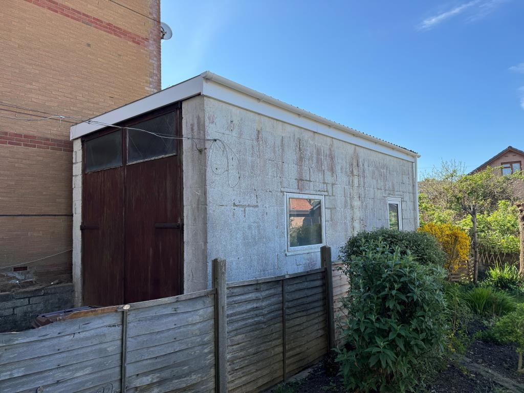 The Workshop/Store at the Side of the Building