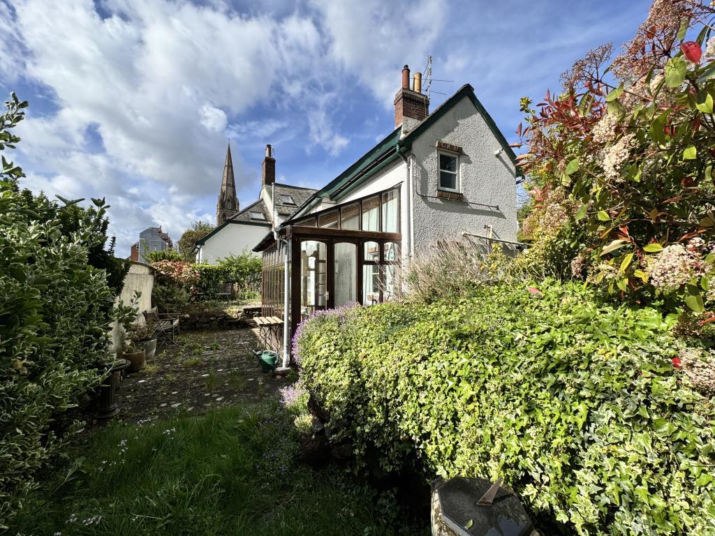 Rear garden looking at the conservatory