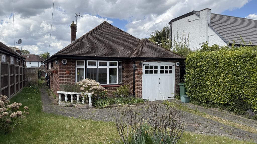 Exterior image of bungalow from front garden