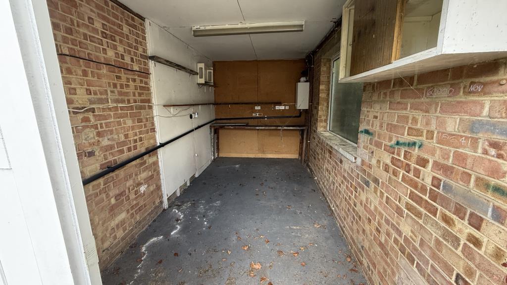 Interior image of garage from double doors looking