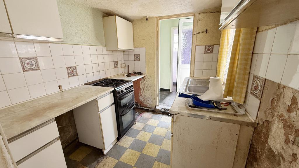 Interior image of kitchen from dining room