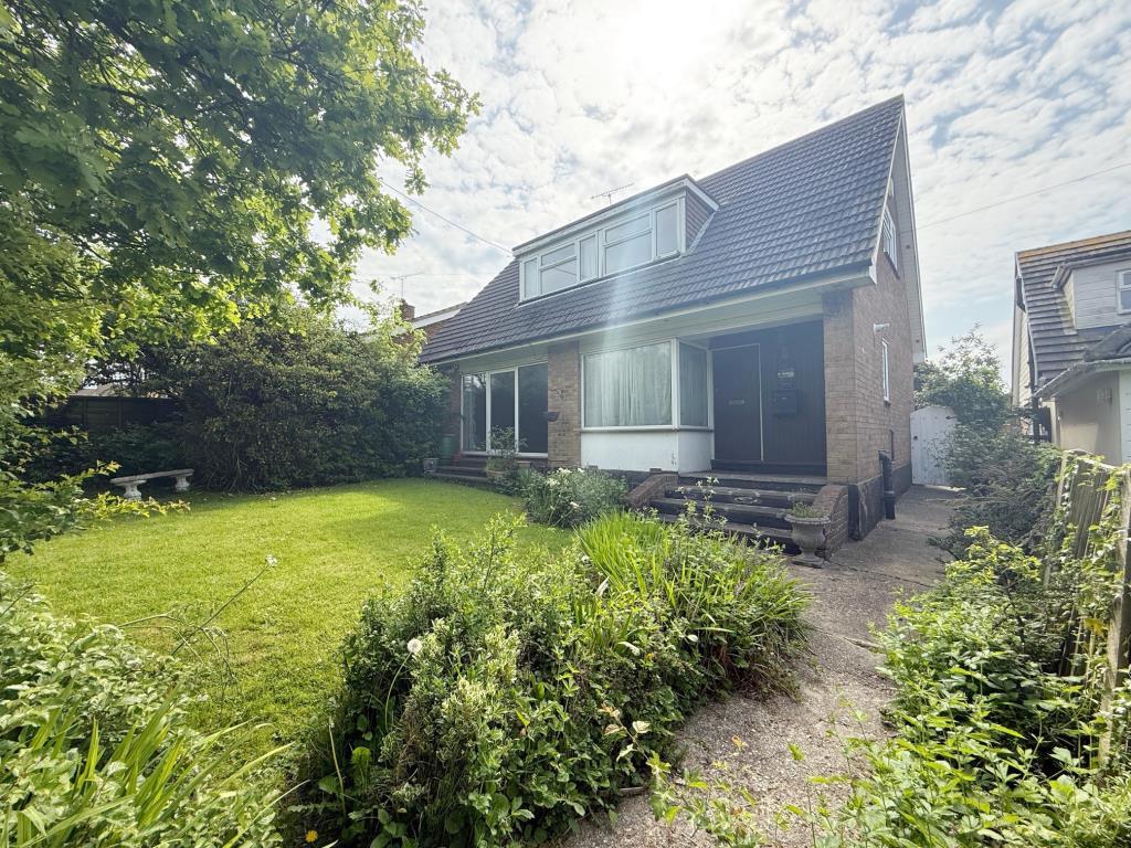Front garden with pathway leading to entrance door