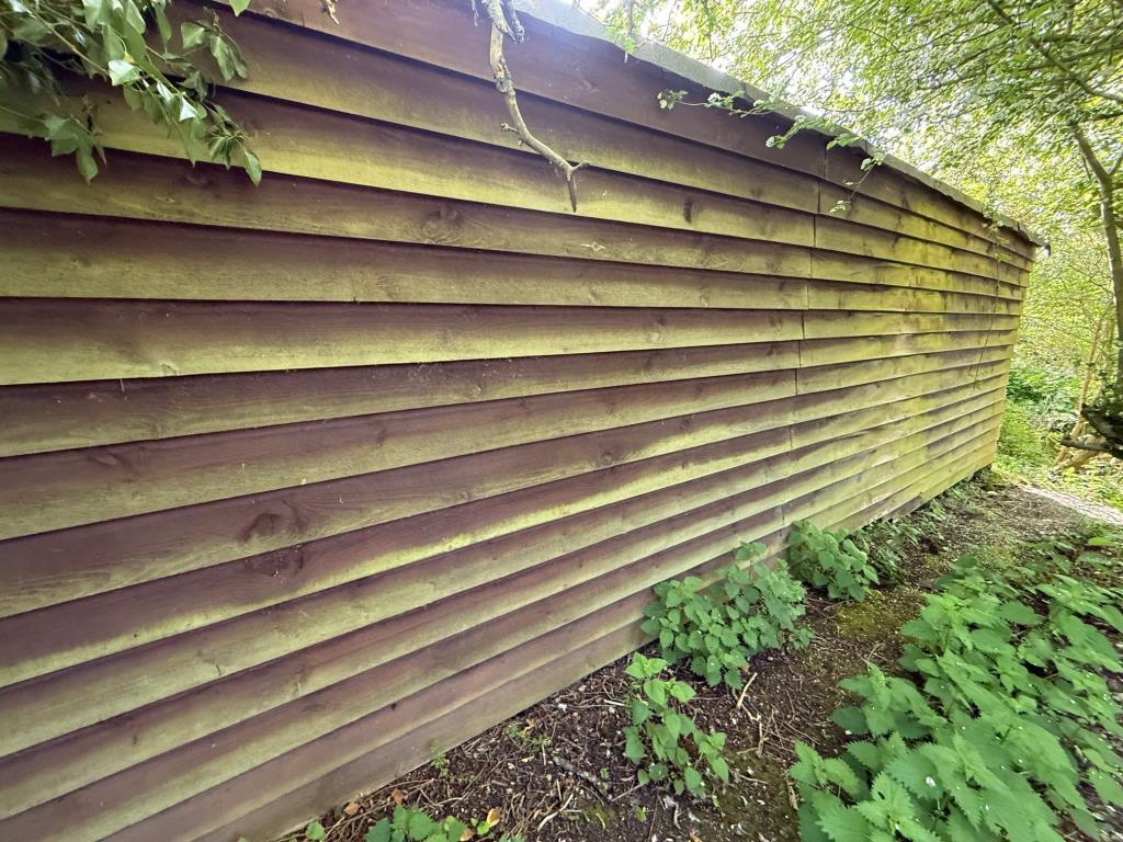 Disused timber stable building on northern end of